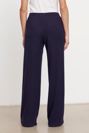 The back view of a woman wearing Velvet by Graham & Spencer's KACIE BRUSHED RIB PANT.