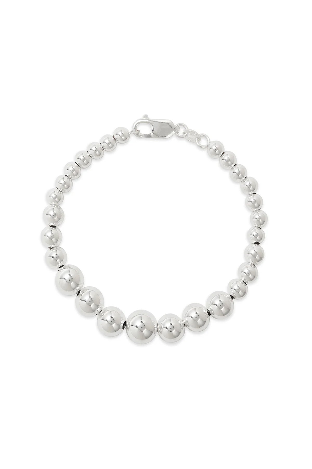 THE GRADUATE BRACELET BY PHYLLIS AND ROSIE by Phyllis+Rosie is a silver bead bracelet featuring uniformly sized spherical beads, a lobster clasp closure, and an effortlessly chic vibe.-37832807284929