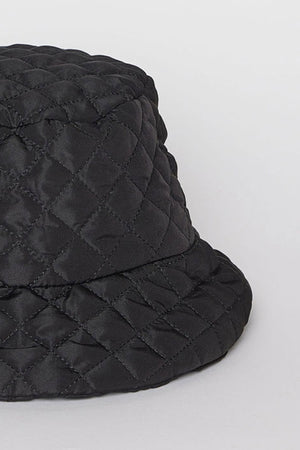 Close-up of the MODERN QUILTED BUCKET HAT in black by Velvet by Graham & Spencer on a neutral background.