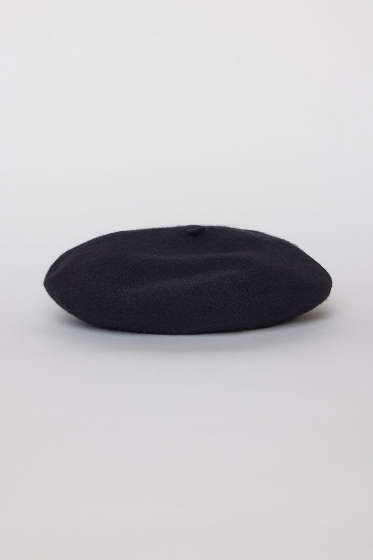A CLASSIC BERET by Velvet by Graham & Spencer lying flat against a plain white background.-37832929280193