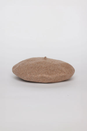 A CLASSIC BERET from Velvet by Graham & Spencer is lying flat against a white background.