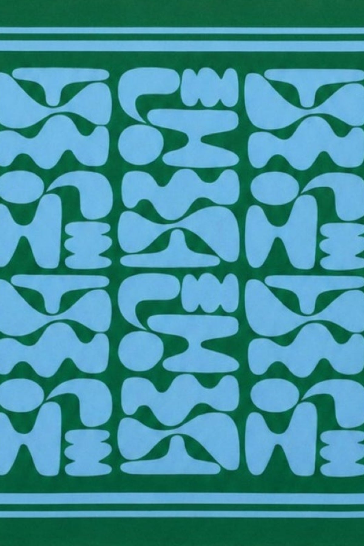 Blue geometric pattern with a green border scarf against a beige background-41645285769409