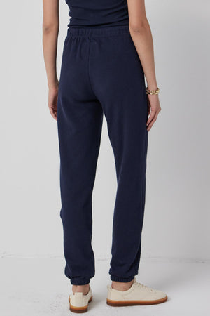 The back view of a woman wearing Velvet by Jenny Graham's WESTLAKE SWEATPANT.