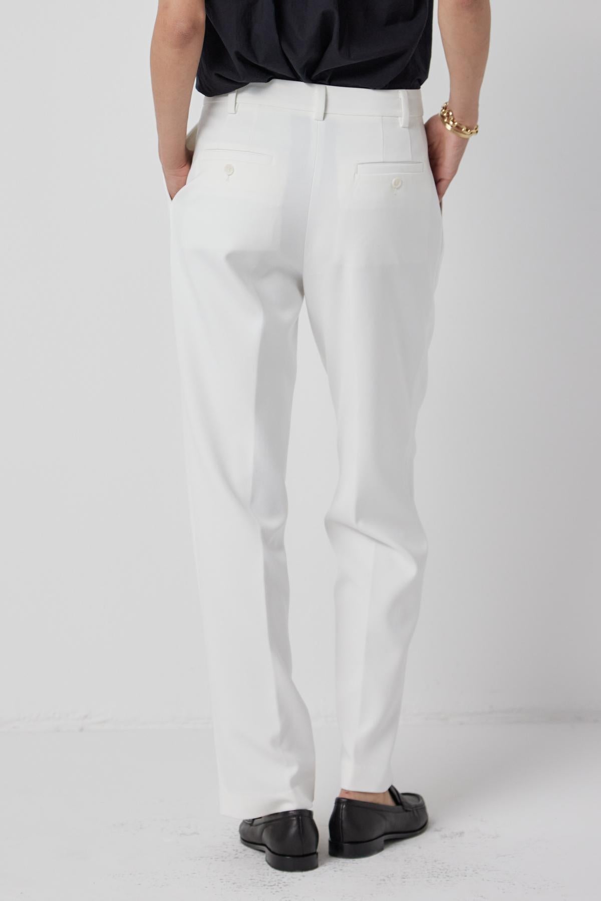 The back view of a woman wearing Velvet by Jenny Graham's BUNDY PANT.-36168659140801