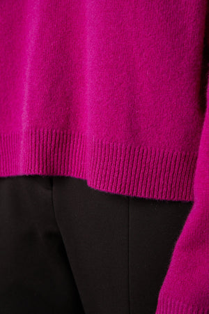 Brynne Cashmere Crew Neck Sweater in bright magenta pink fabric detail