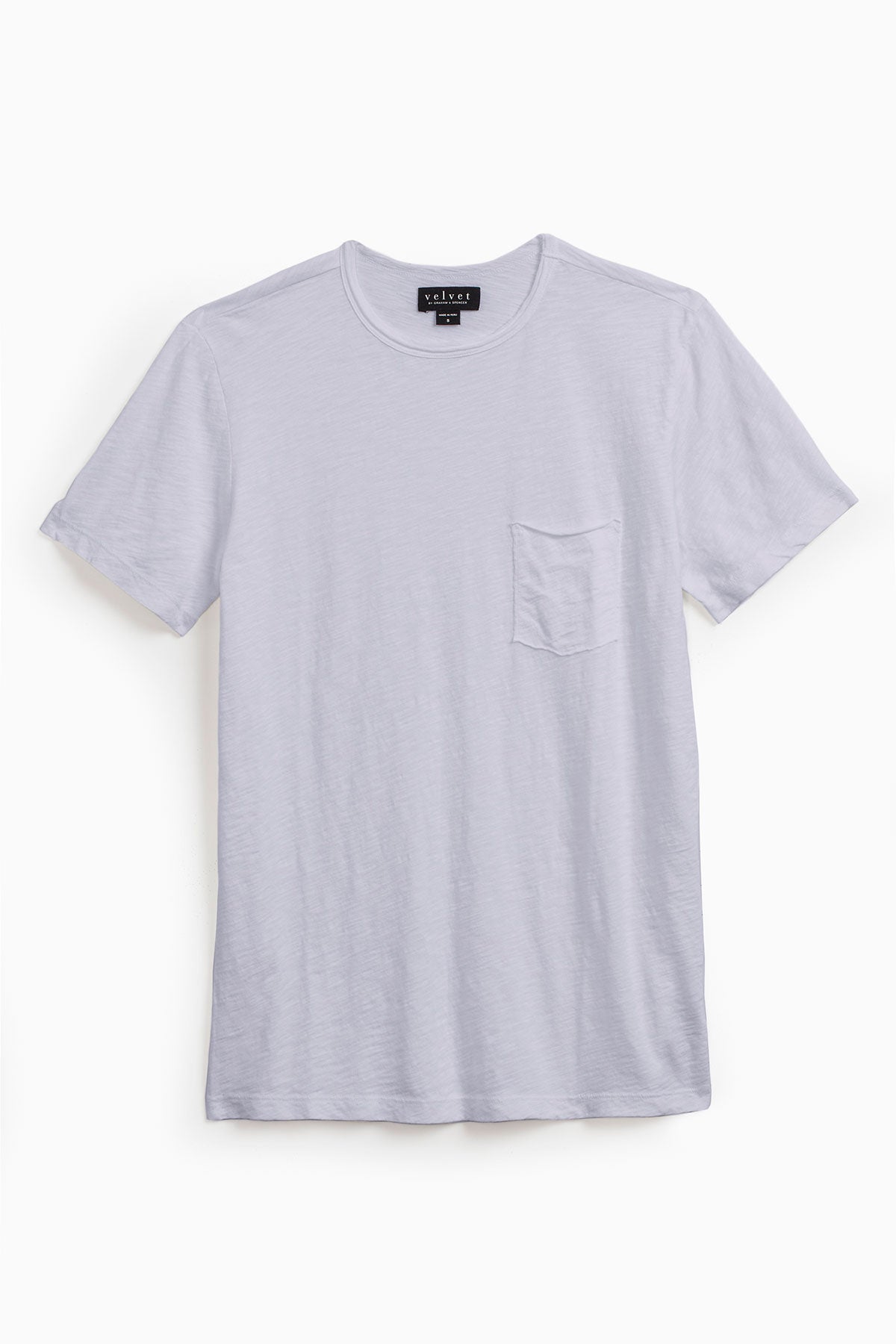The CHAD TEE by Velvet by Graham & Spencer is a plain light gray t-shirt, made from soft Peruvian cotton with a crew neckline and chest pocket, displayed on a white background.-38942923817153