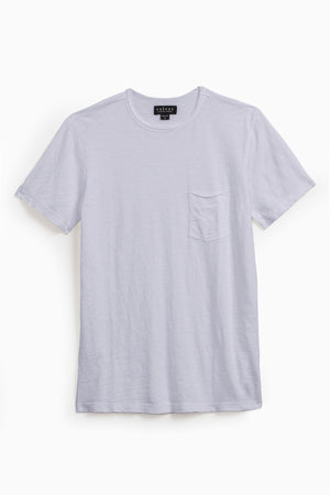 The CHAD TEE by Velvet by Graham & Spencer is a plain light gray t-shirt, made from soft Peruvian cotton with a crew neckline and chest pocket, displayed on a white background.