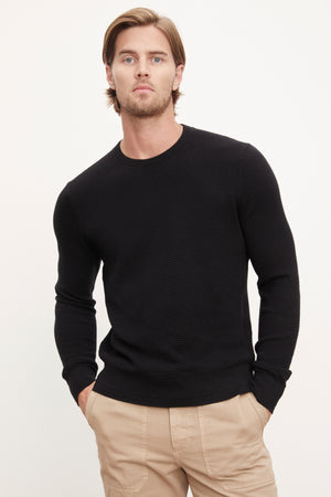 A man wearing the Velvet by Graham & Spencer ACE THERMAL CREW.