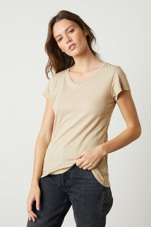 Odelia Crew Neck Tee in sesame with black denim front