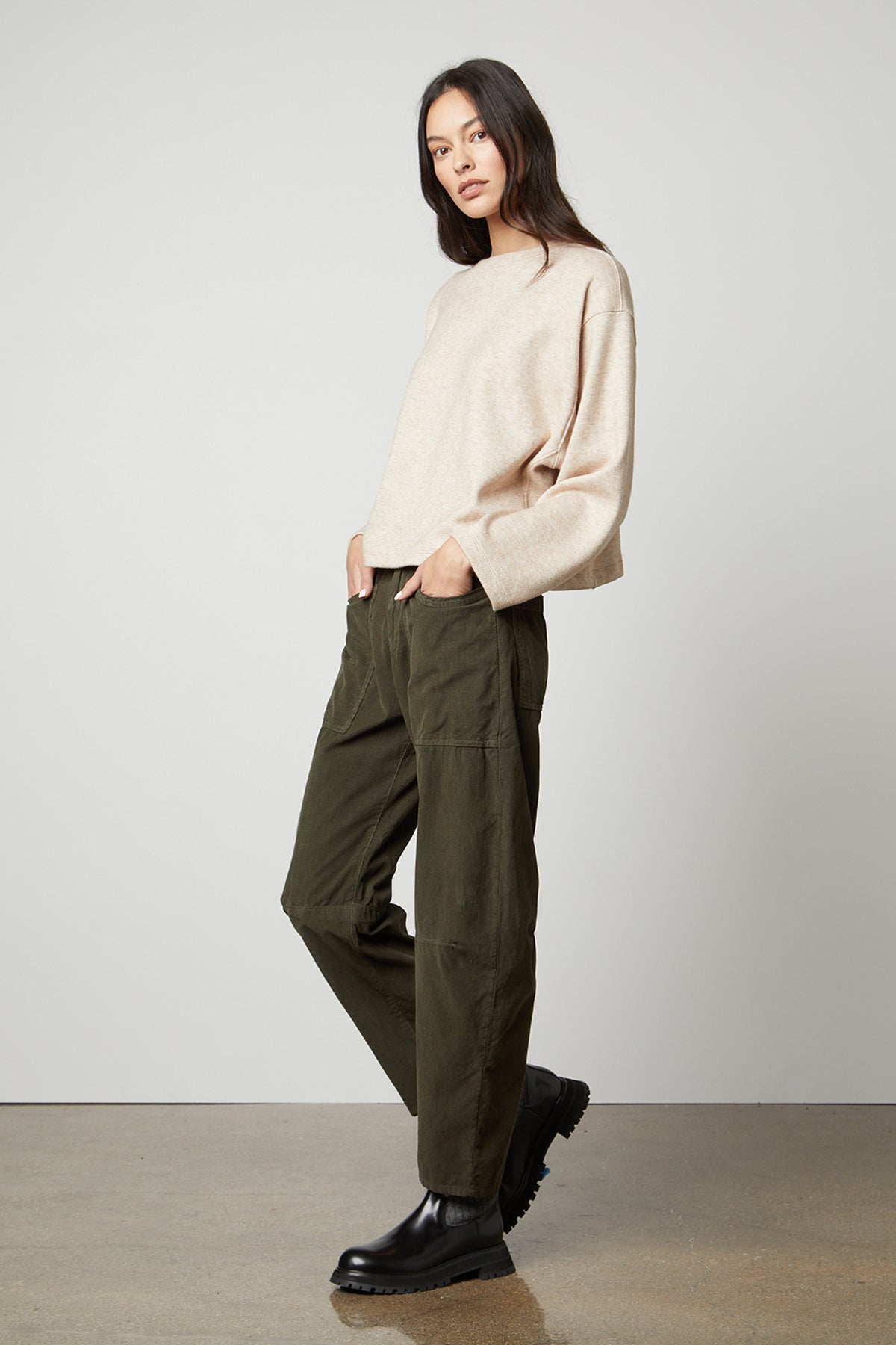 The model is wearing NIA DOUBLE KNIT CROPPED CREW by Velvet by Graham & Spencer, showcasing effortless style.-35503558885569