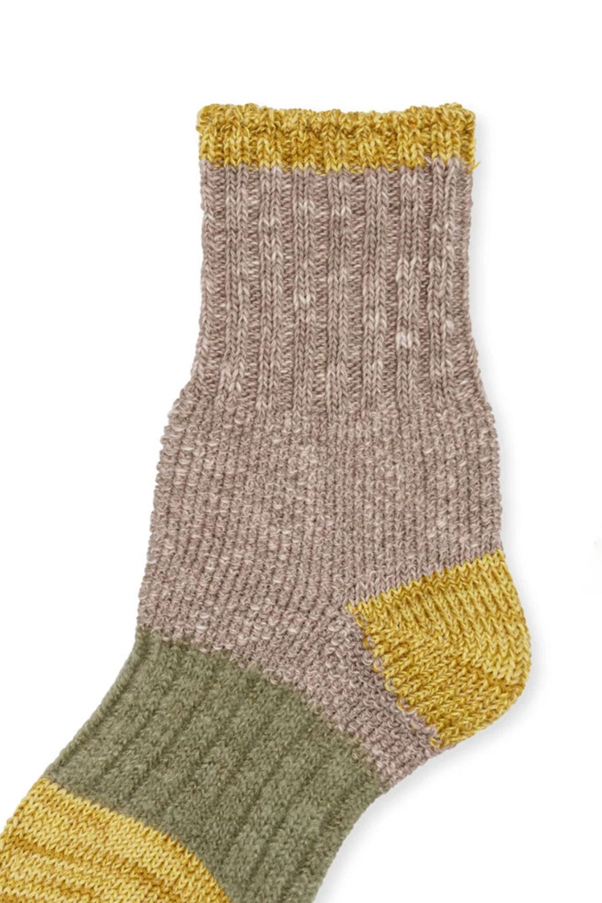 A single knitted sock with a ribbed texture, featuring three color blocks: a yellow cuff, a gray body, and a green and yellow foot. This piece of legwear showcases unique designs that stand out in any wardrobe. This is the DAPPLE CREW SOCKS BY HANSEL FROM BASEL by Hansel From Basel.-35711027085505