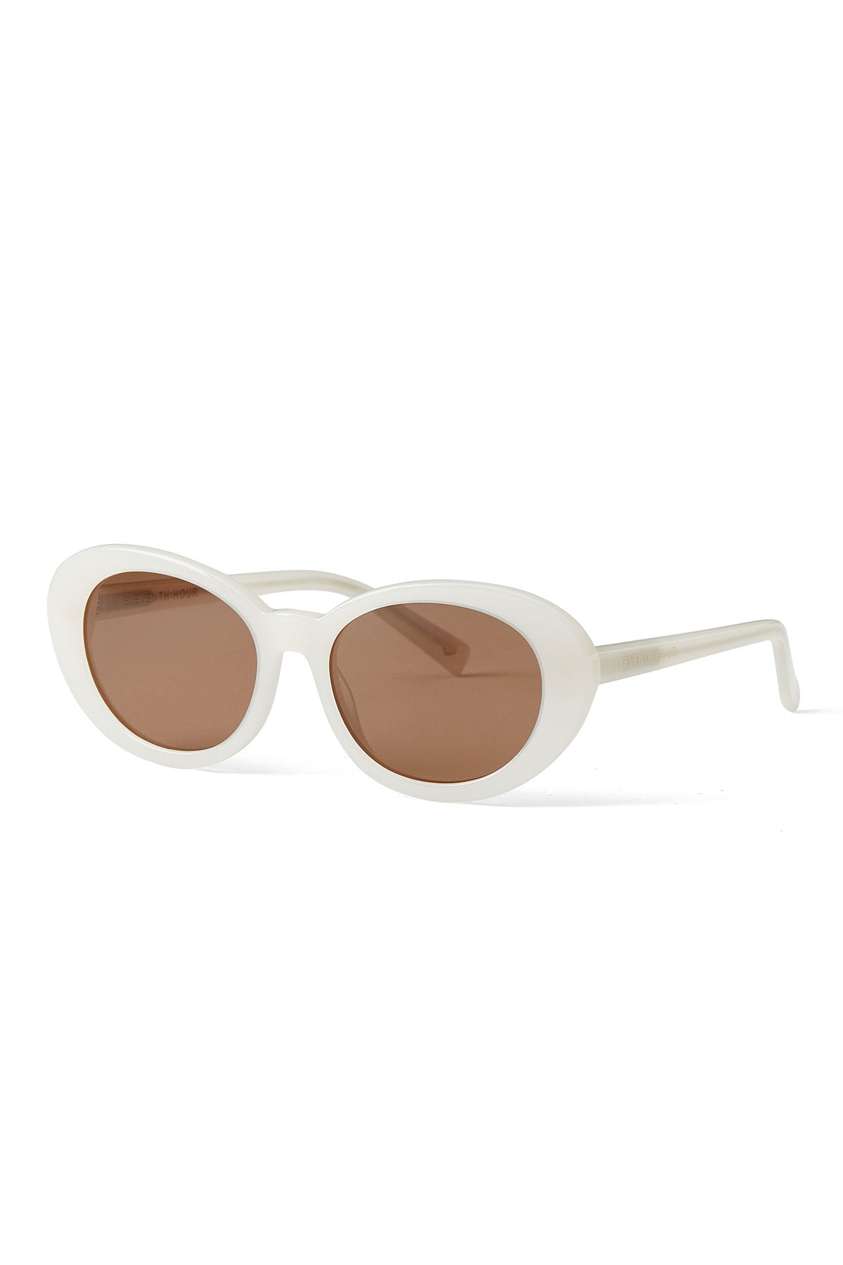 DOLCE SUNGLASSES BY ELEVENTH HOUR from Eleventh Hour feature a white oval frame with brown tinted lenses, displayed on a plain white background.-39219256623297