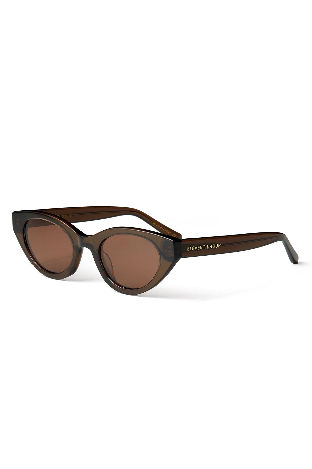A pair of GIRLS TRIP SUNGLASSES BY ELEVENTH HOUR from Eleventh Hour, featuring a dark brown cat-eye frame, tinted lenses, and "ELEVENTH HOUR" in gold on the temples.-39219259277505