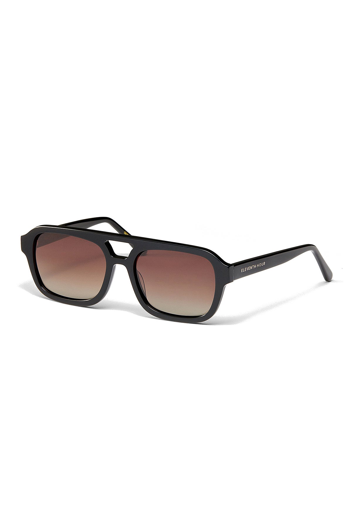 The LATE CHECKOUT SUNGLASSES BY ELEVENTH HOUR feature a sleek black rectangular frame, gradient brown lenses, a subtle Eleventh Hour logo on the arm, and are crafted from premium materials.-39293551247553