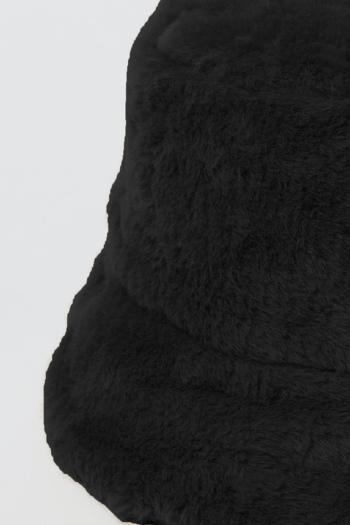 A chic FAUX FUR BUCKET HAT with a furry lining by Velvet by Graham & Spencer.-35211049795777