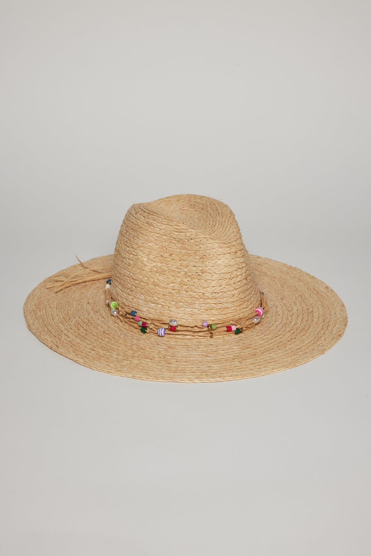 A Velvet by Graham & Spencer GEMA CONTINENTAL HAT with a colorful beaded band around the base of the crown, displayed against a plain white background.-36289718386881