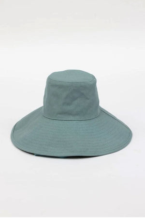 The LIVVY CANVAS SUN HAT by Velvet by Graham & Spencer, light teal with a wide brim, is set against a plain white background.