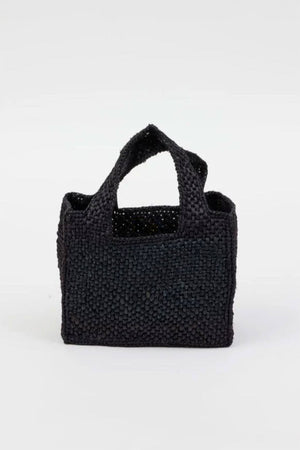 The MINI LULU TOTE by Velvet by Graham & Spencer is a small black woven handbag with short handles, set against a plain white background.