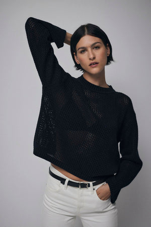 A model wearing a Velvet by Jenny Graham KANAN SWEATER.