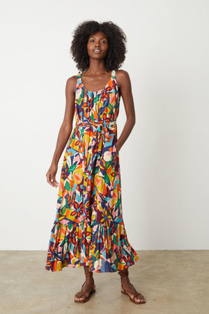 A woman wearing the ESTELLE PRINTED LINEN DRESS.