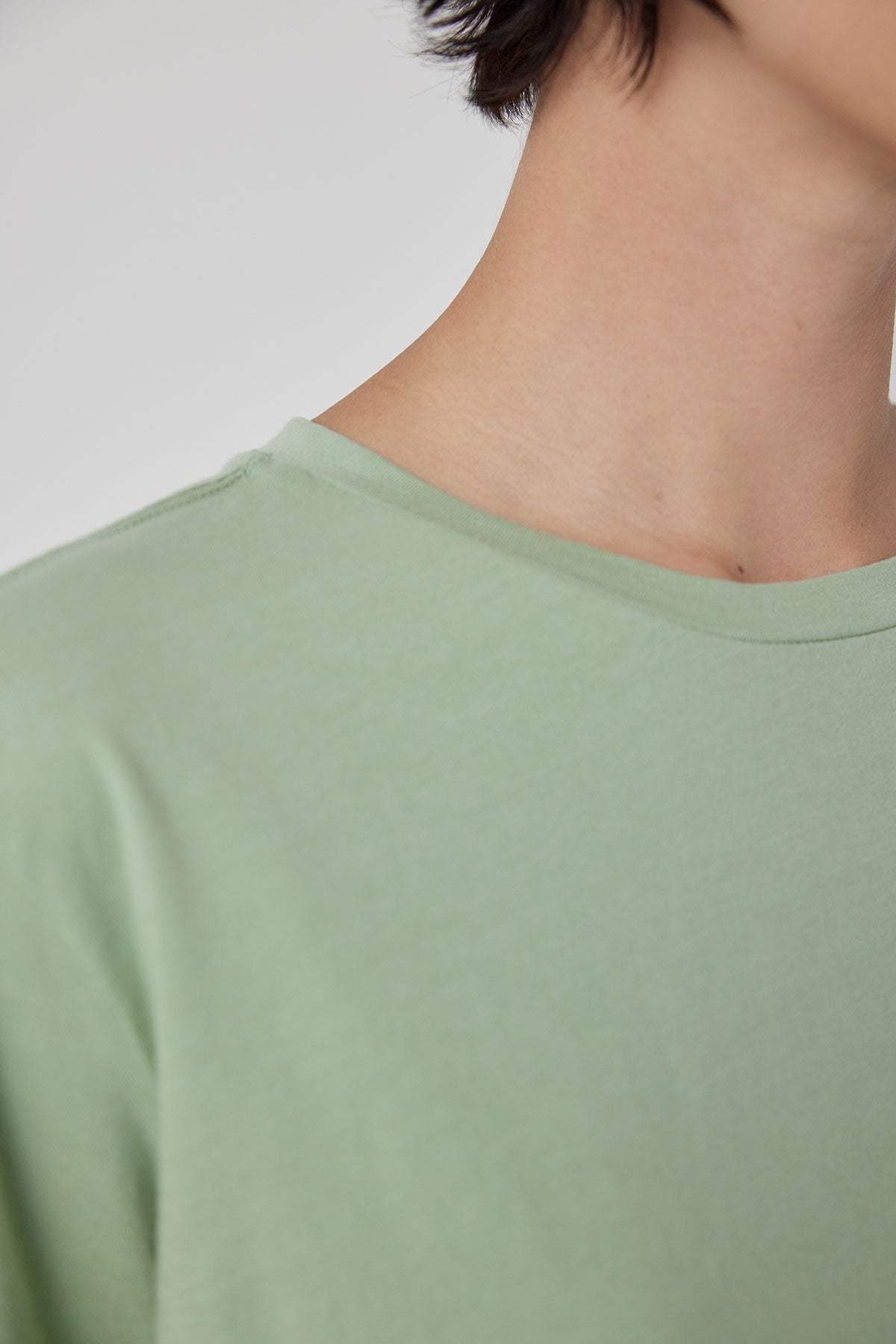 The back view of a woman wearing a Velvet by Jenny Graham TOPANGA TEE.-36212404093121