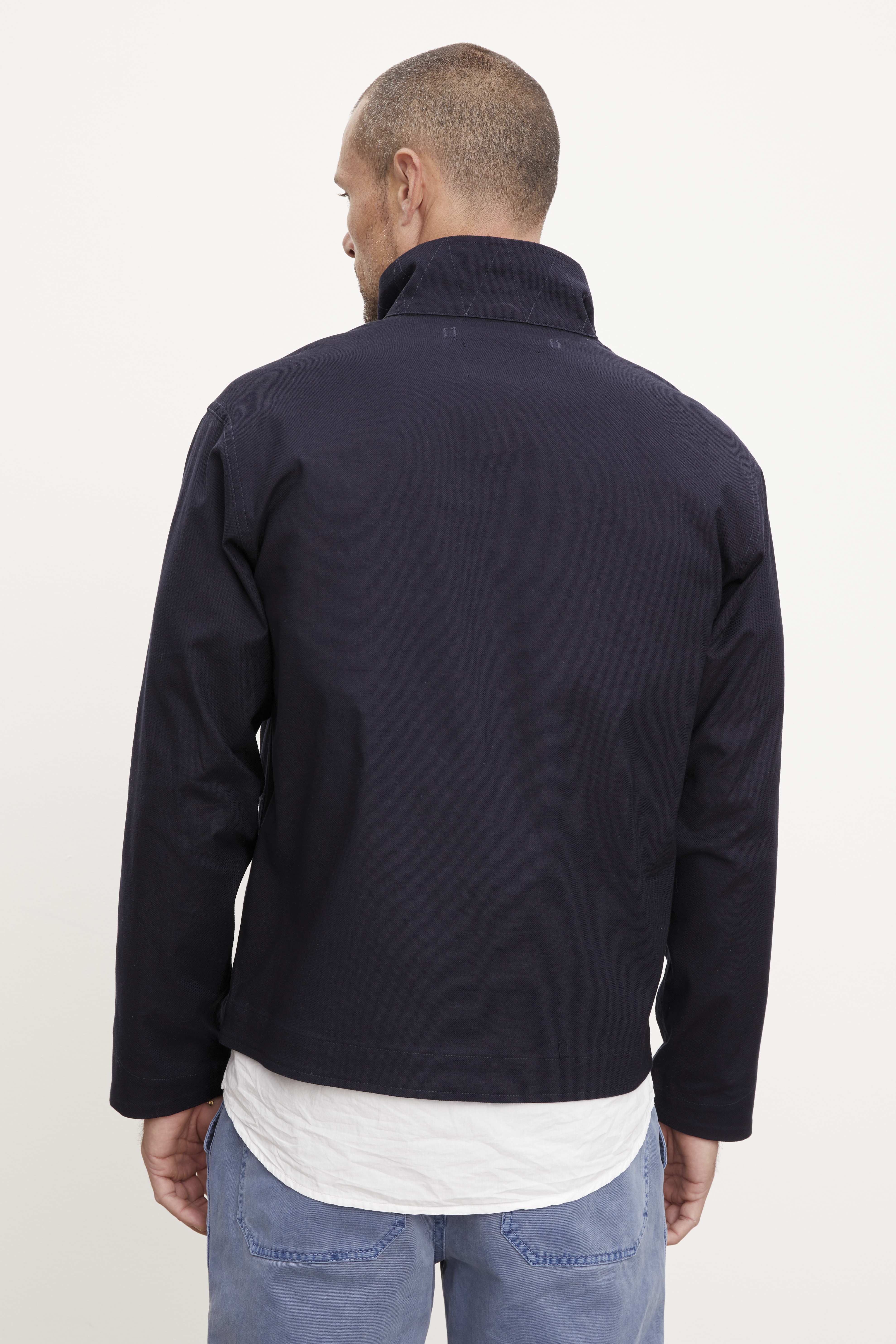   The back view of a man in a Velvet by Graham & Spencer MARLON ZIP-UP JACKET. 