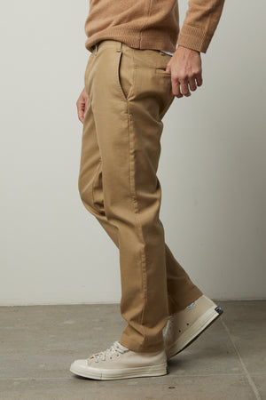 A man wearing a tailored look sweater and Velvet by Graham & Spencer AIDEN COTTON TWILL PANT.