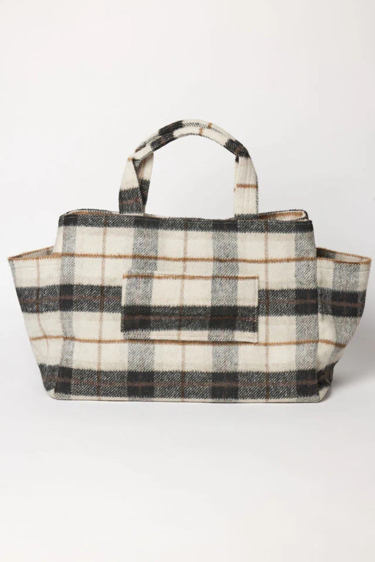 The PLAID TOTE by Velvet by Graham & Spencer features a black, brown, and cream plaid on a soft polyester wool blend with two handles—ideal as a stylish weekender bag.-40099847667905