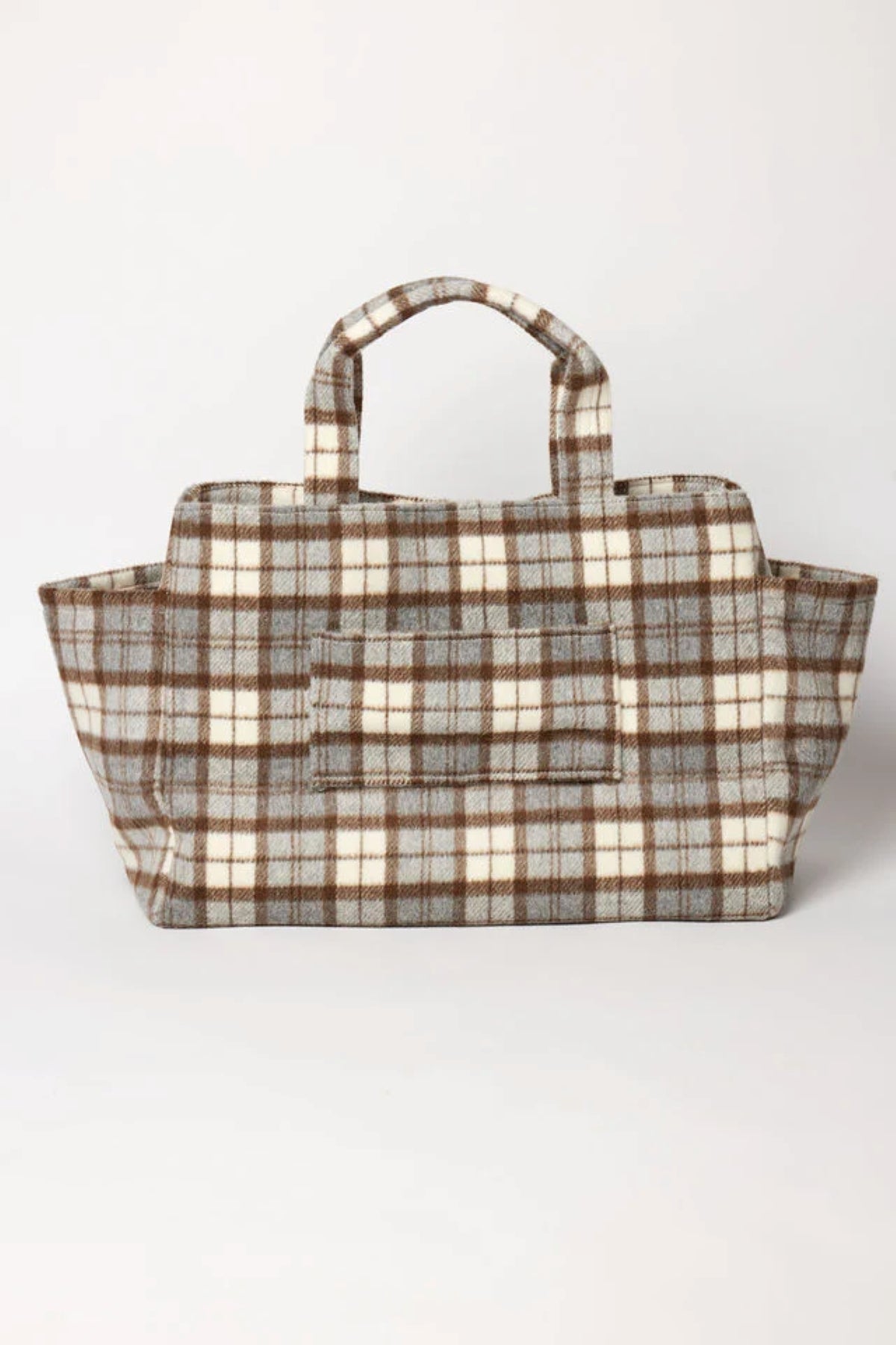 The PLAID TOTE by Velvet by Graham & Spencer features a rectangular shape, short handles, and a brown, gray, and white polyester wool blend plaid design, shown on a plain white background.-40105307013313