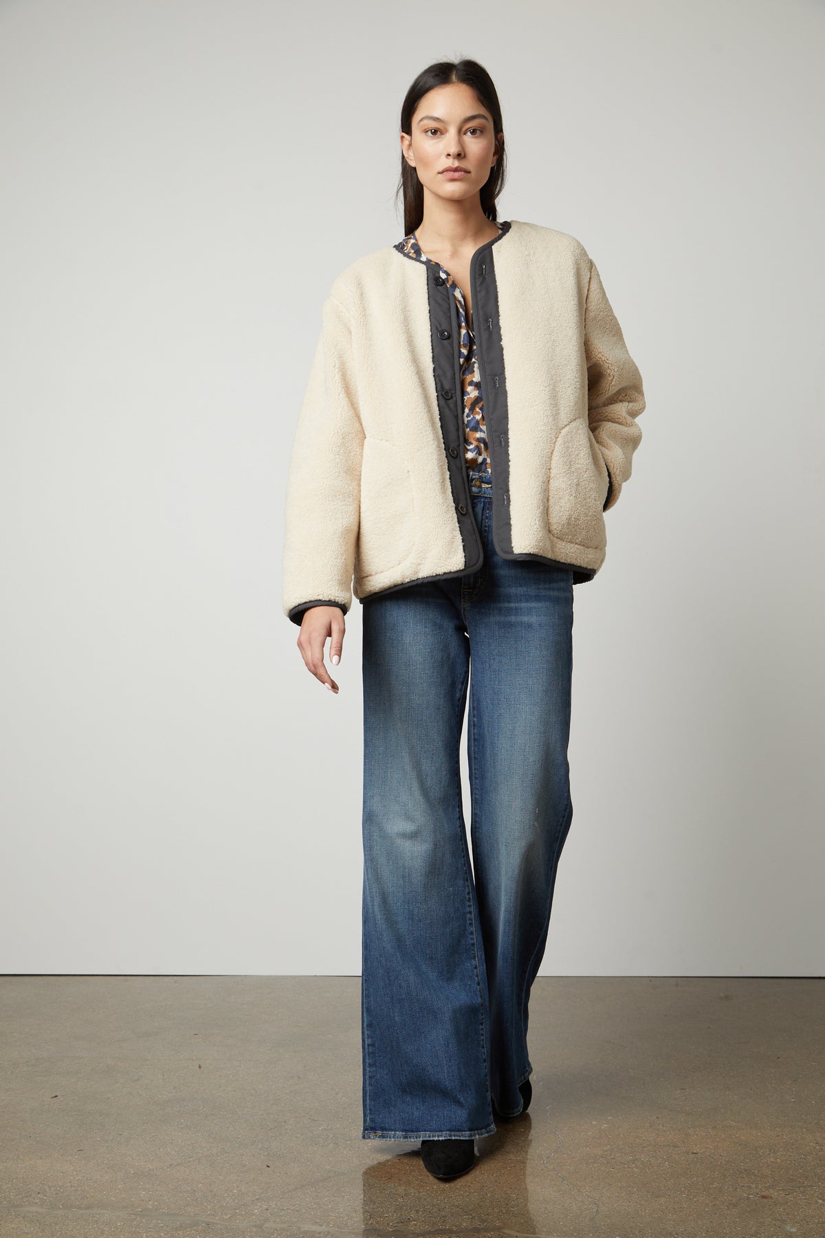 The model is wearing a Velvet by Graham & Spencer Marissa Reversible Quilted Sherpa Jacket.-35507746242753
