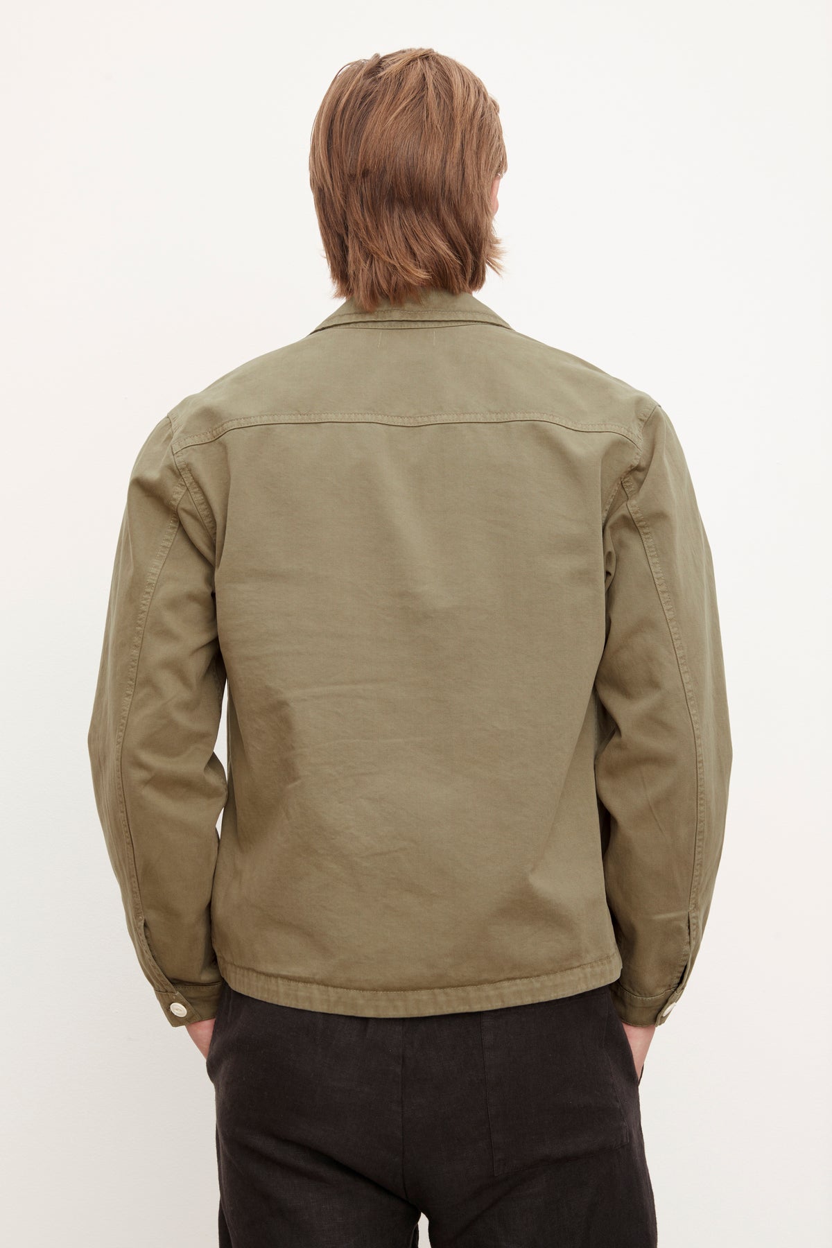 The back view of a man wearing a FLANNERY SANDED TWILL BUTTON-UP JACKET from Velvet by Graham & Spencer.-36009002926273