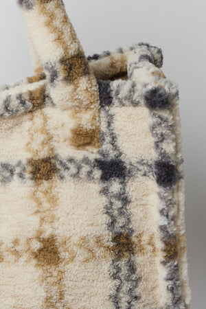 A beige and black plaid SMALL TEDDY TOTE by Velvet by Graham & Spencer on a white background.