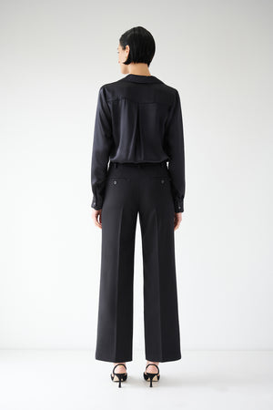 The back view of a woman wearing Velvet by Jenny Graham's PRINCE PANT.