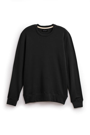 The SOREN PULLOVER by Velvet by Graham & Spencer is a black crewneck sweatshirt with long sleeves and a cozy brushed interior, shown laid flat on a white background.