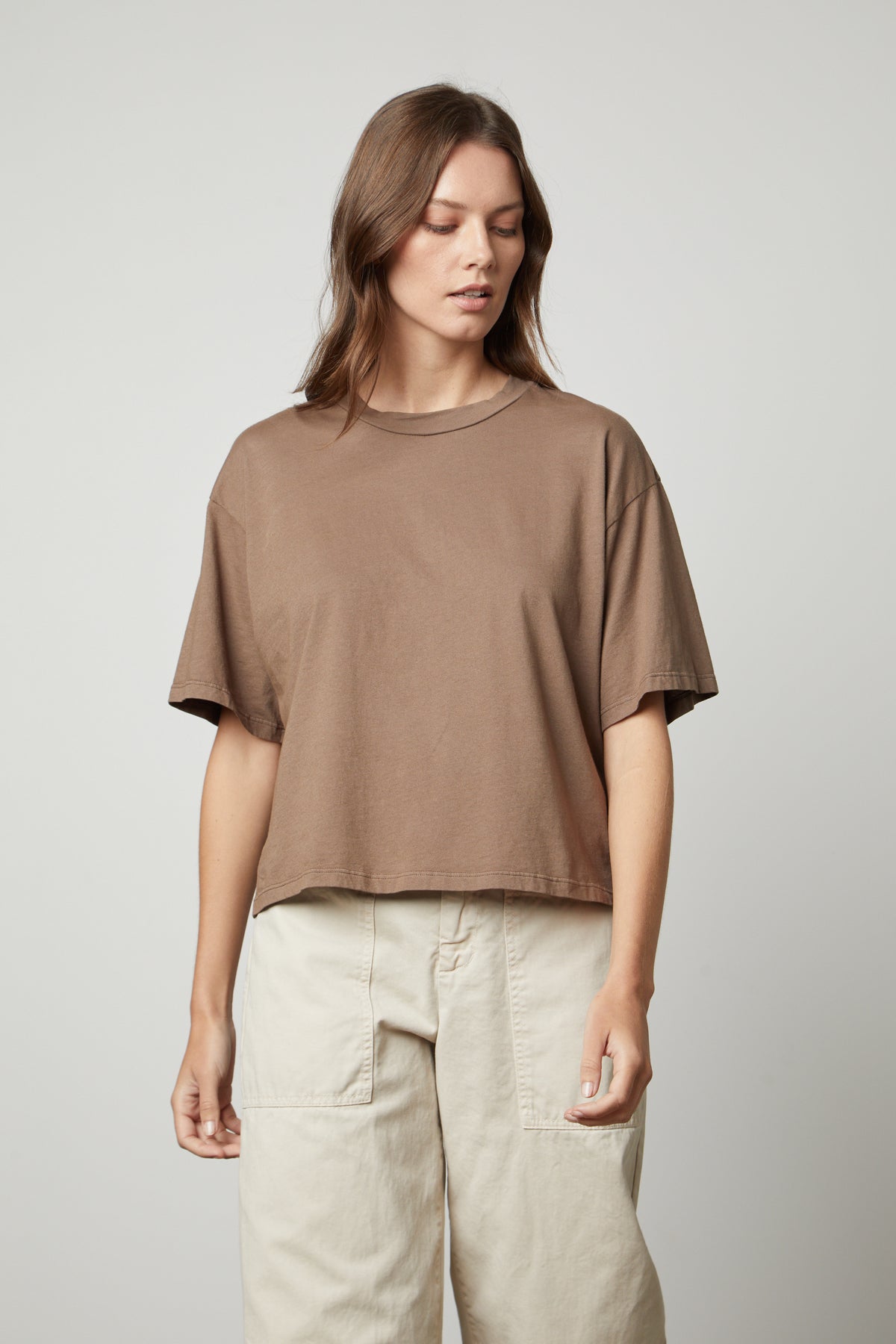 The model is wearing an oversized fit Velvet by Graham & Spencer CLARAH CREW NECK TEE made from sueded jersey fabric.-35655921205441