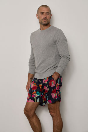 A man wearing Velvet by Graham & Spencer's COLT PRINTED SHORT.