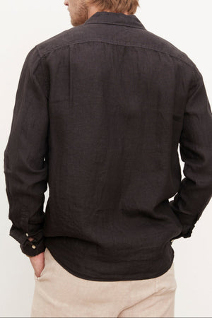 A stylish man's Velvet by Graham & Spencer Benton Linen Button-Up Shirt crafted from woven linen fabric.