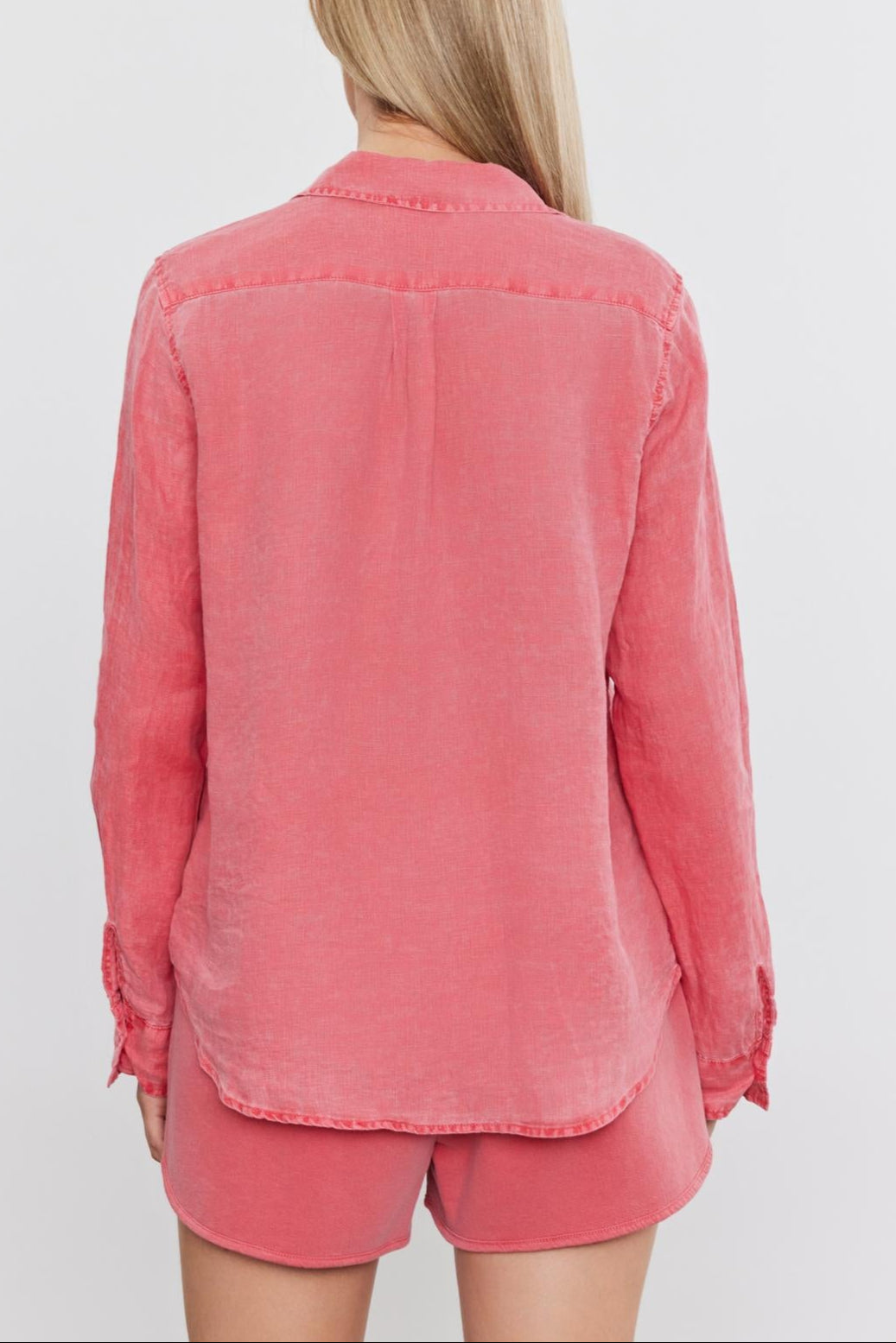 Rear view of a woman wearing a Velvet by Graham & Spencer NATALIA LINEN BUTTON-UP SHIRT and matching shorts, standing against a white background.-36910075805889