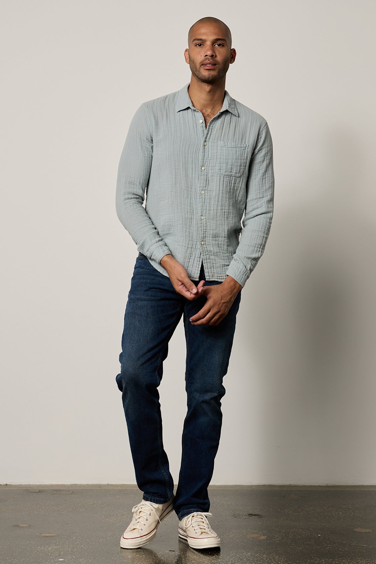 Elton Button-Up Shirt in ice blue with dark blue denim and converse full length front