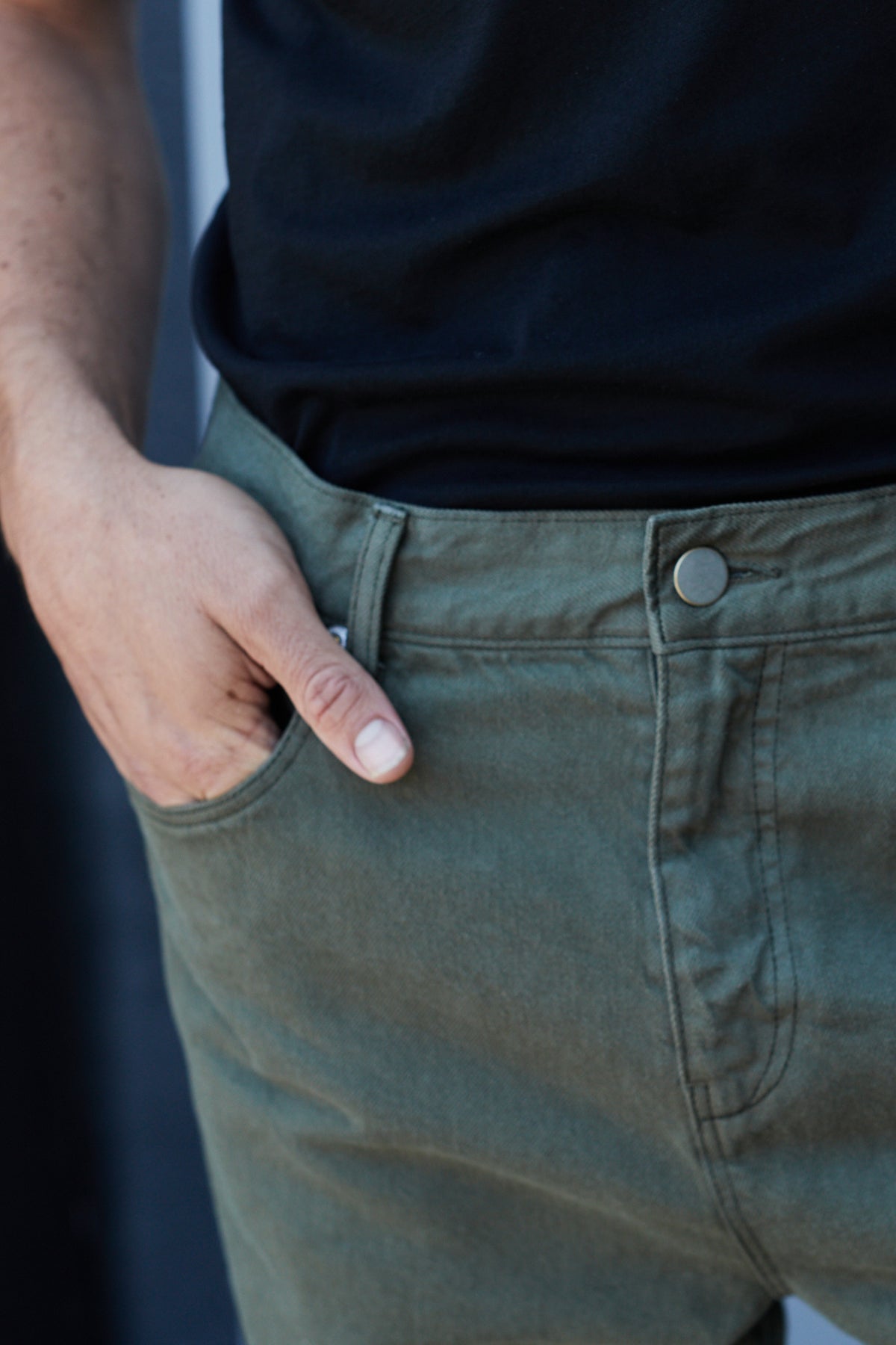 a man wearing JOSEPH COTTON CANVAS PANTS by Velvet by Graham & Spencer.-25083081457857