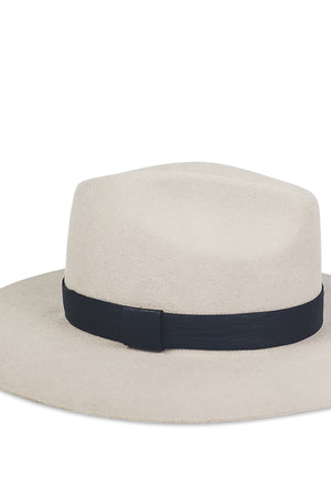 A timeless LUXE AVA FEDORA hat with a black band by Velvet by Graham & Spencer.