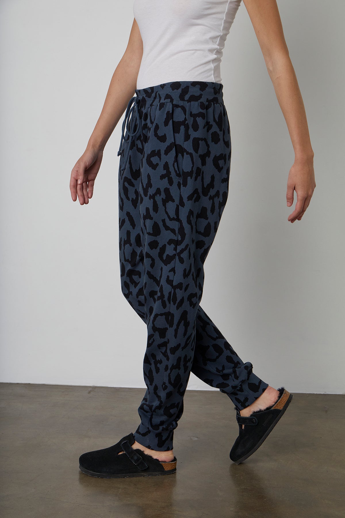 A woman wearing Velvet by Graham & Spencer's GWEN PRINTED JOGGER jogger pants with a relaxed fit.-23119957524673
