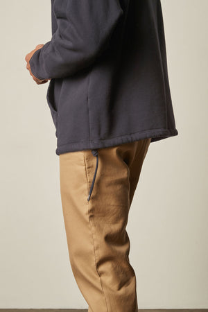 Baldwin Quarter-Zip Sweatshirt in ink side hem detail