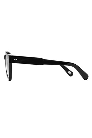Side view of CHIMI EYEWEAR 003 by Chimi—black rectangular unisex sunglasses with thick arms, a glossy finish, and European-made quality.