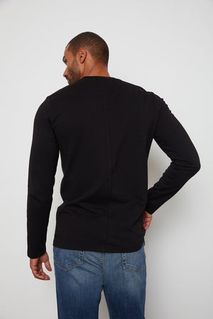 brad in black back shirt