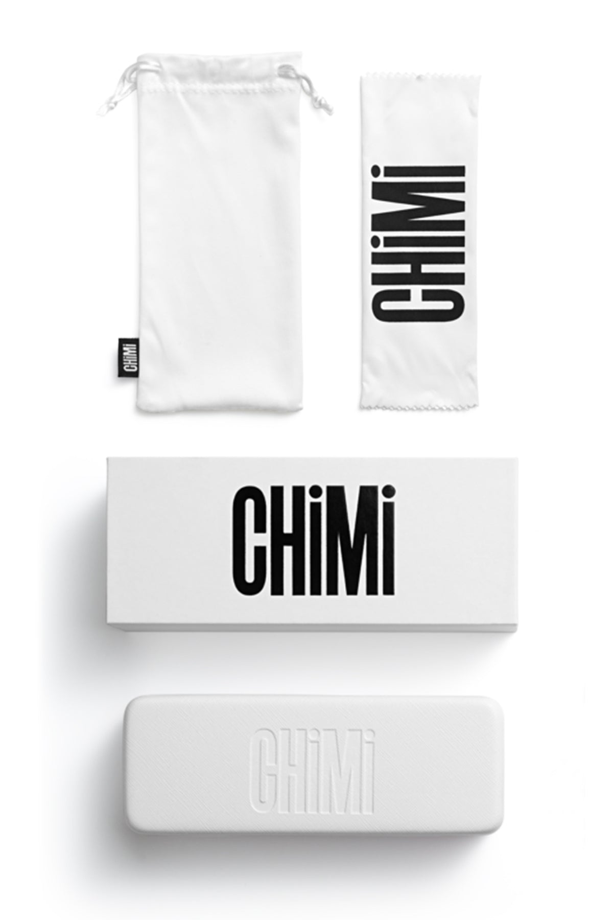 A white drawstring pouch, cleaning cloth, box, and hard case—all with bold “CHIMI” branding—highlight the European-made quality of Chimi Eyewear 003, a premium unisex accessory.-17397489238209