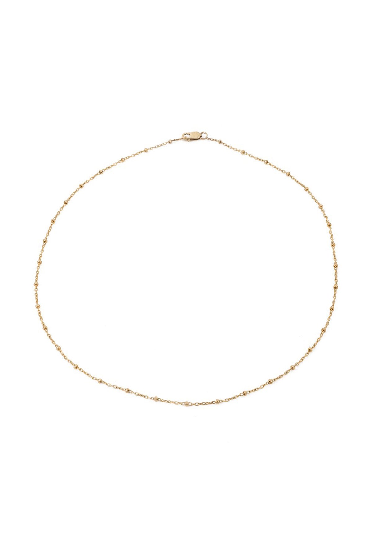 The DOT CHAIN CHOKER by Mara Carrizo Scalise is a delicate gold-filled beaded choker with small accents and a lobster clasp, shown on a white background.-17396853899457