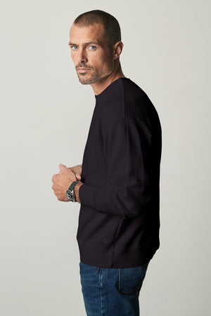 Sirus Crew Neck Sweatshirt in black with blue denim side