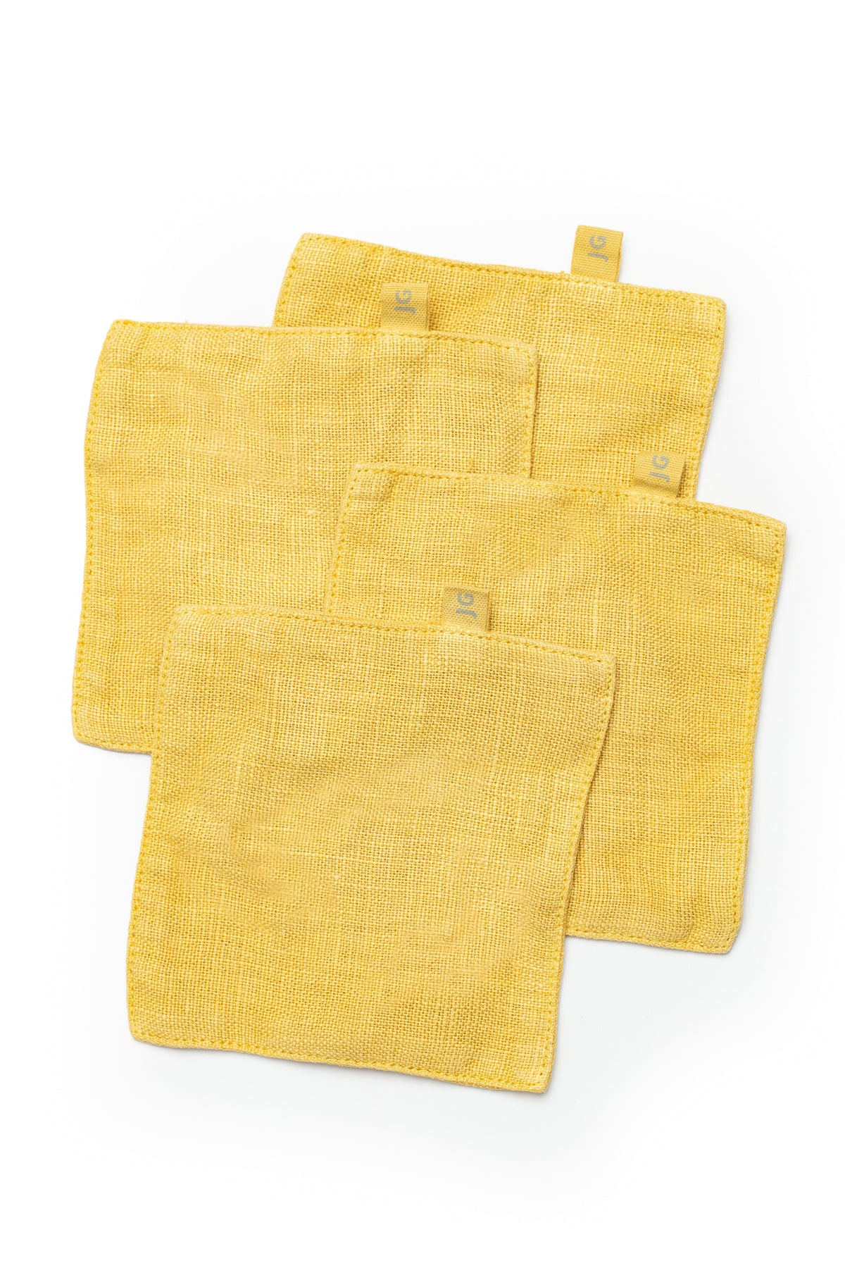 four Jenny Graham Home LINEN COASTERS (SET OF 4) on a white background.-15073230586049