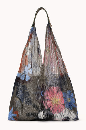 The LARGE FLORAL PRINT MESH TOTE BY EPICE features pink, blue, and white flowers on transparent black mesh. This luxe accessory offers a bold color combination for those seeking sophistication and style.